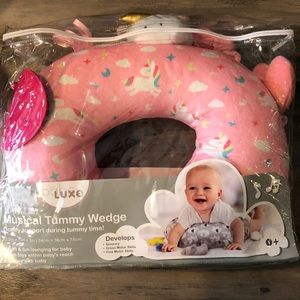 Infant musical tummy wedge